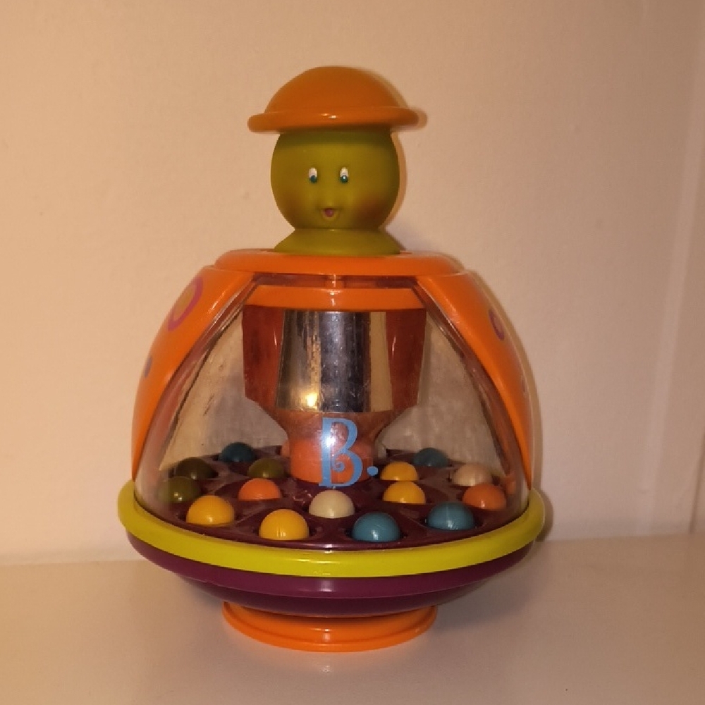 Colorful Orange Spinning Pop Ball Toy for Kids